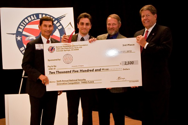 Gathering at the National Security Innovation Competition in April are (l-r) Maj. Gen. Mark Volcheff, USAF (Ret.), executive director, National Homeland Defense Foundation (NHDF); Spiros Mantzavinos, Northeastern University; Rich Mock, chapter representative; and Don Addy, president of NHDF.
